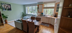 Forest-windowed 400m to beach Lielupe apartment